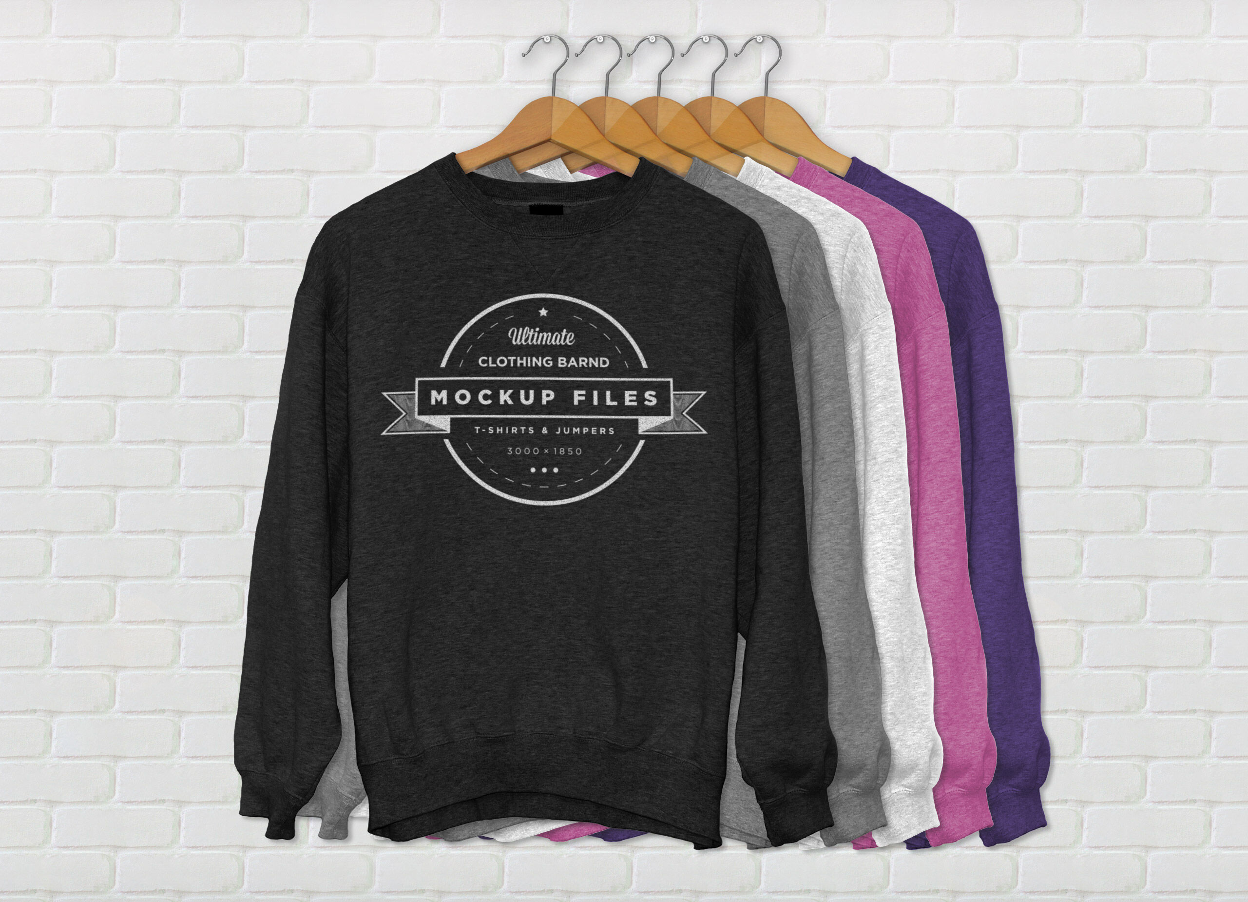 Five Crew Neck Jumpers on Cloth Hangers in a Row Mockup preview