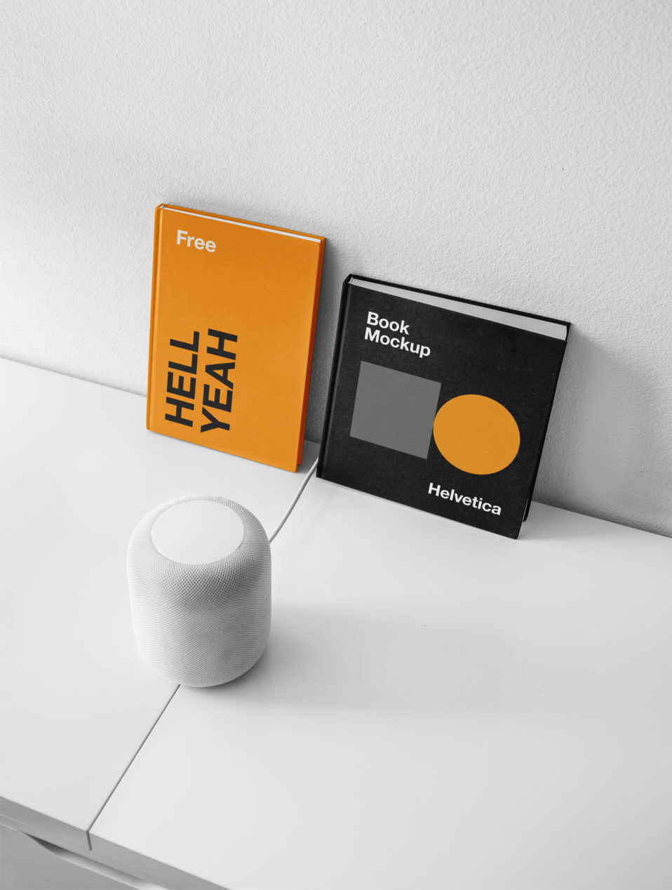 Mockup Showing Two Sized Hardcover Books Against Wall