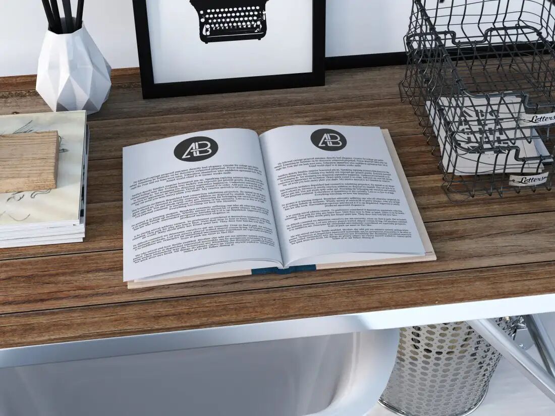 Open Book Surrounded by Stationery Items Mockup