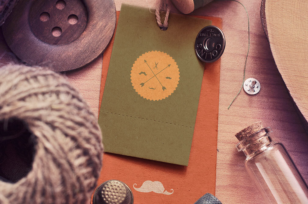 Mockup Featuring Four Vintage Scenes of Label Tags Decorated with Sewing Items preview