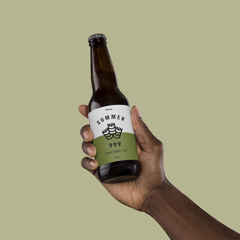 Mockup a Man’s Hand Holding a Beer Bottle
