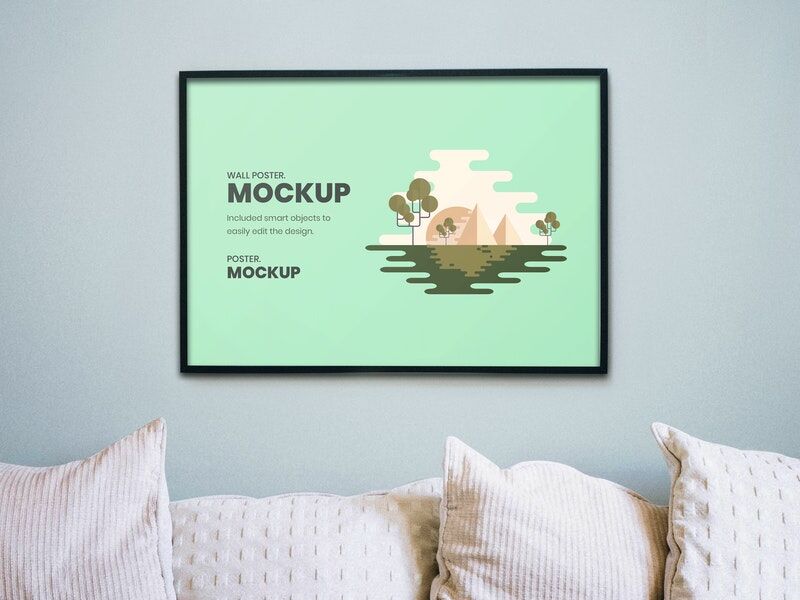 Mockup Showing a Poster Attached to a Wall and Decorated with Pillows