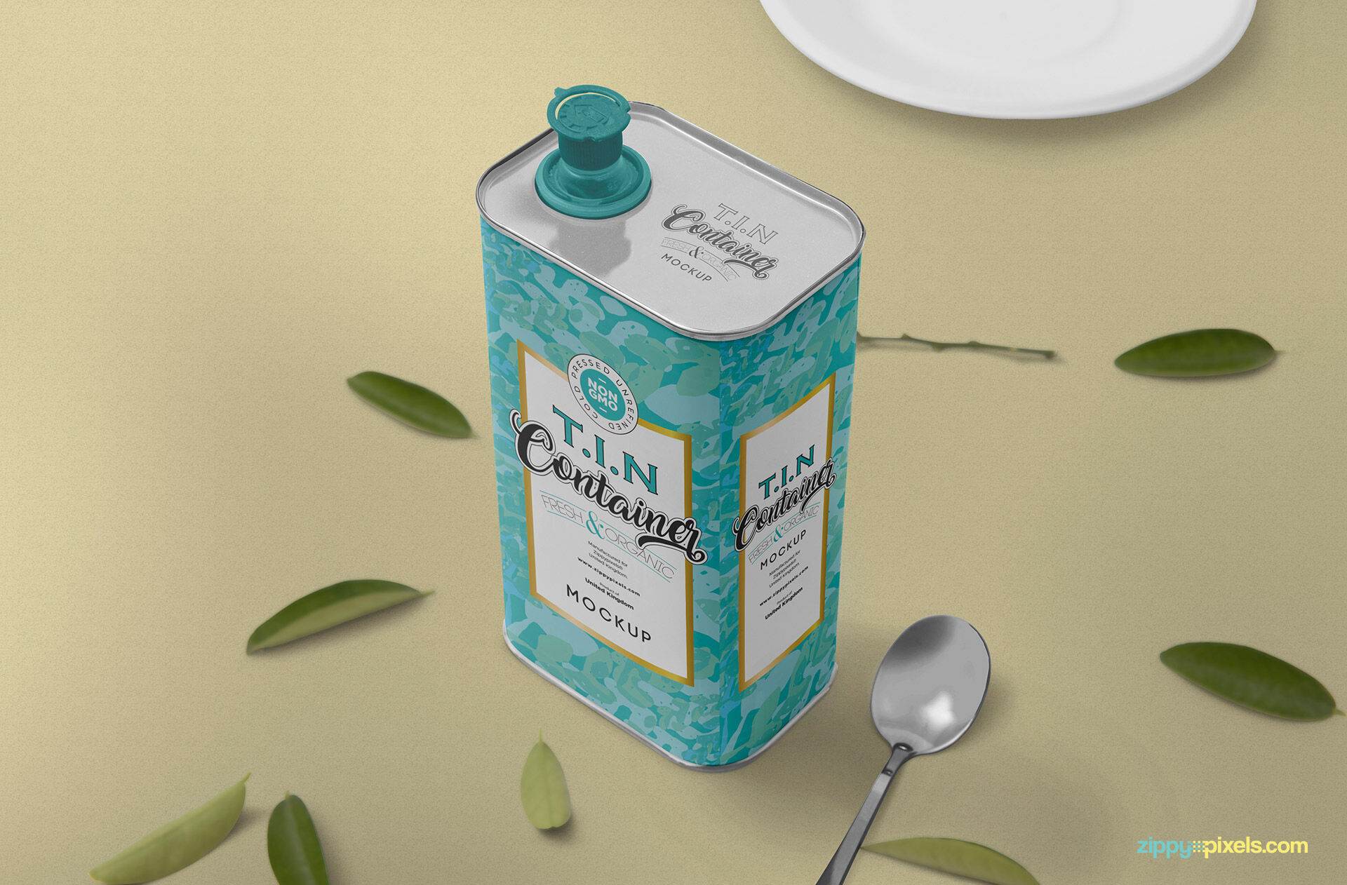 Tin Can Mockup with Leaves and Spoon and Plate on the Table