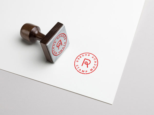 Mockup of a Diagonal Rubber Stamp on a Sheet of Paper