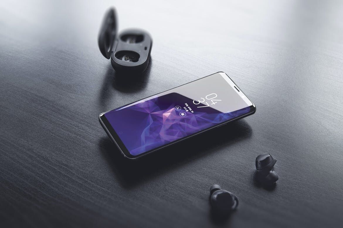 Mockup Displaying Galaxy S9 Plus with Airpod and its Opened Case
