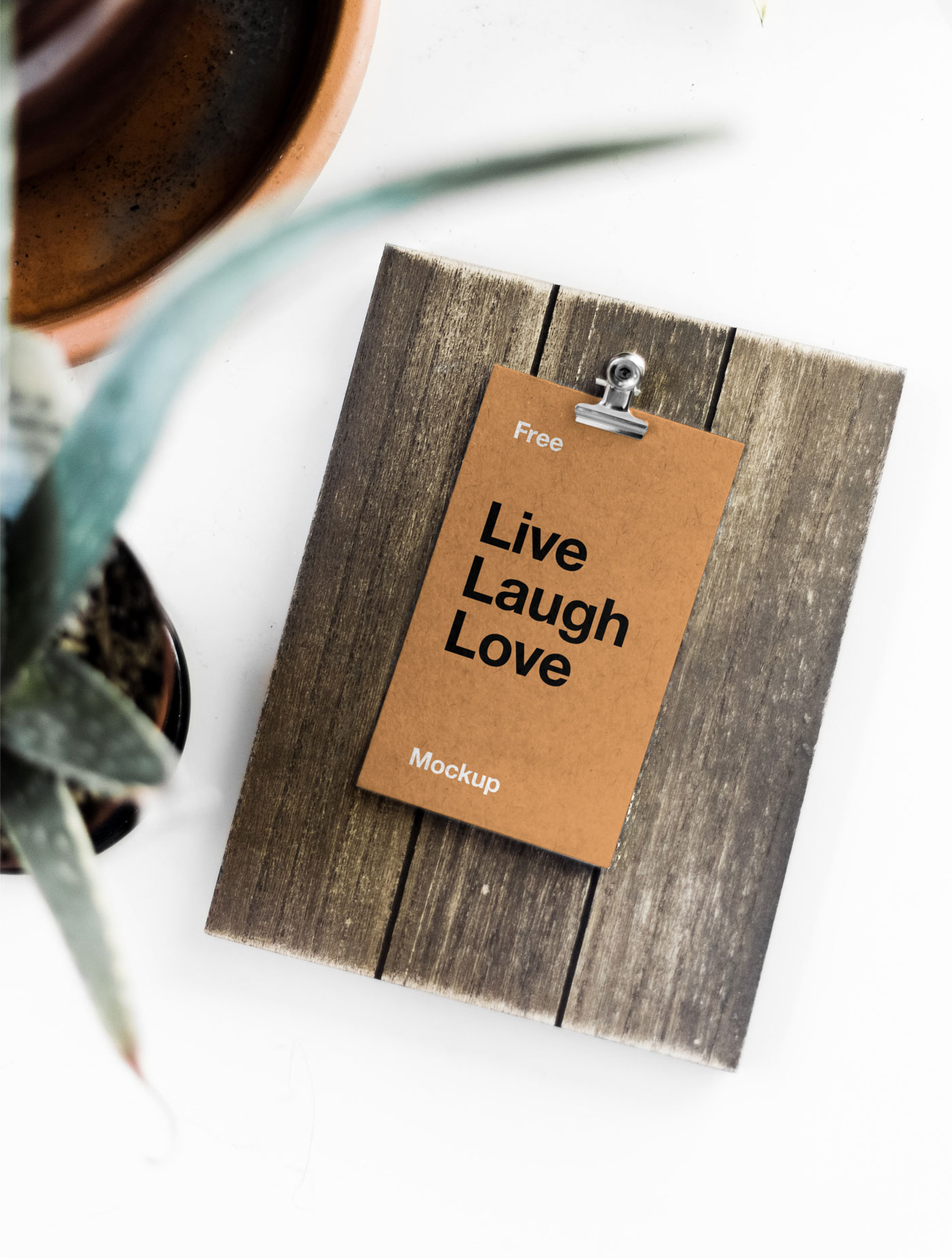 Mockup Featuring Overhead View of Card on Wooden Board