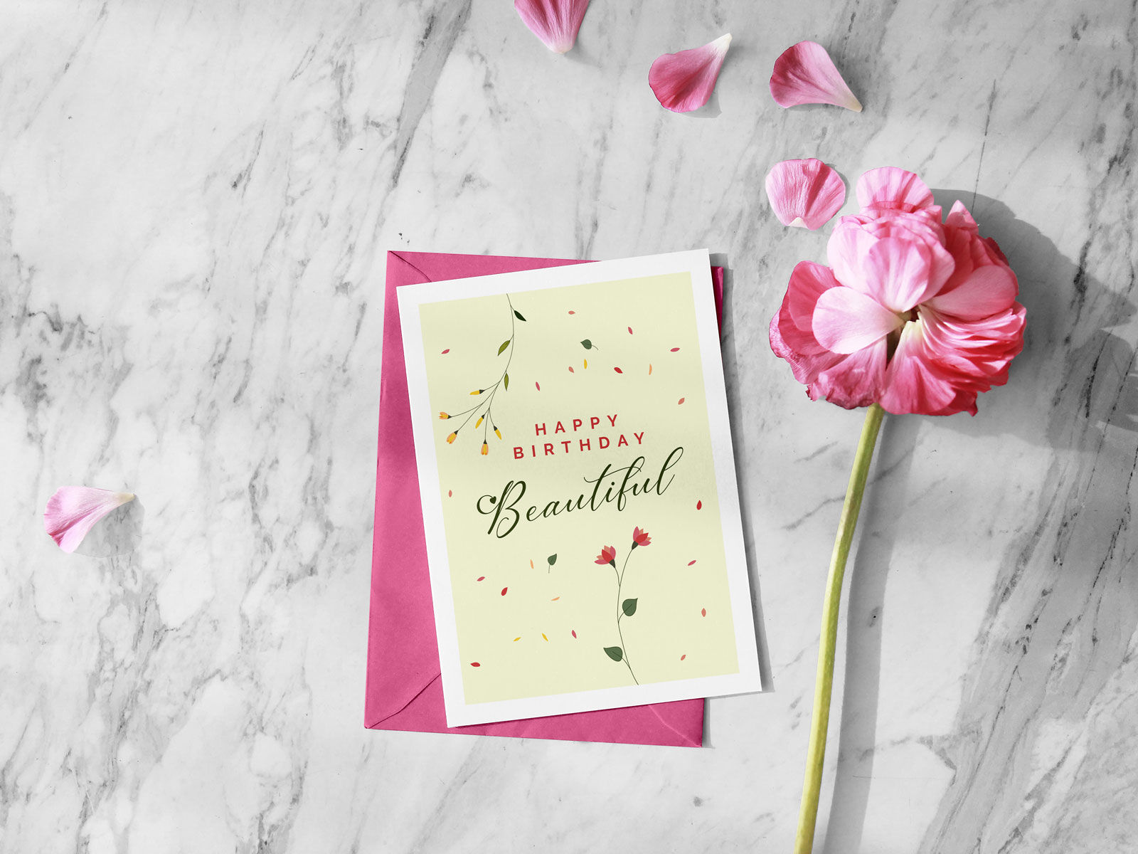 Greeting Card and Envelope Mockup Next to a Flower