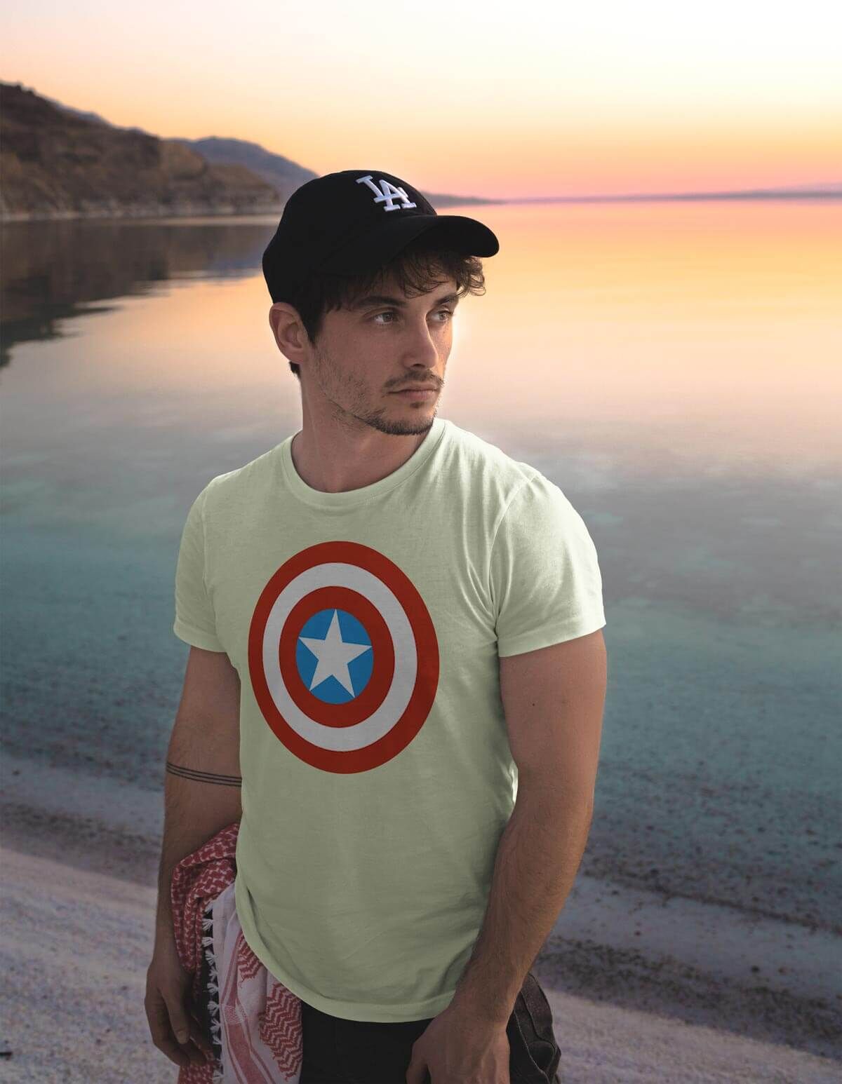 Man Wearing T-Shirt Back to a Beautiful Landscape Mockup preview