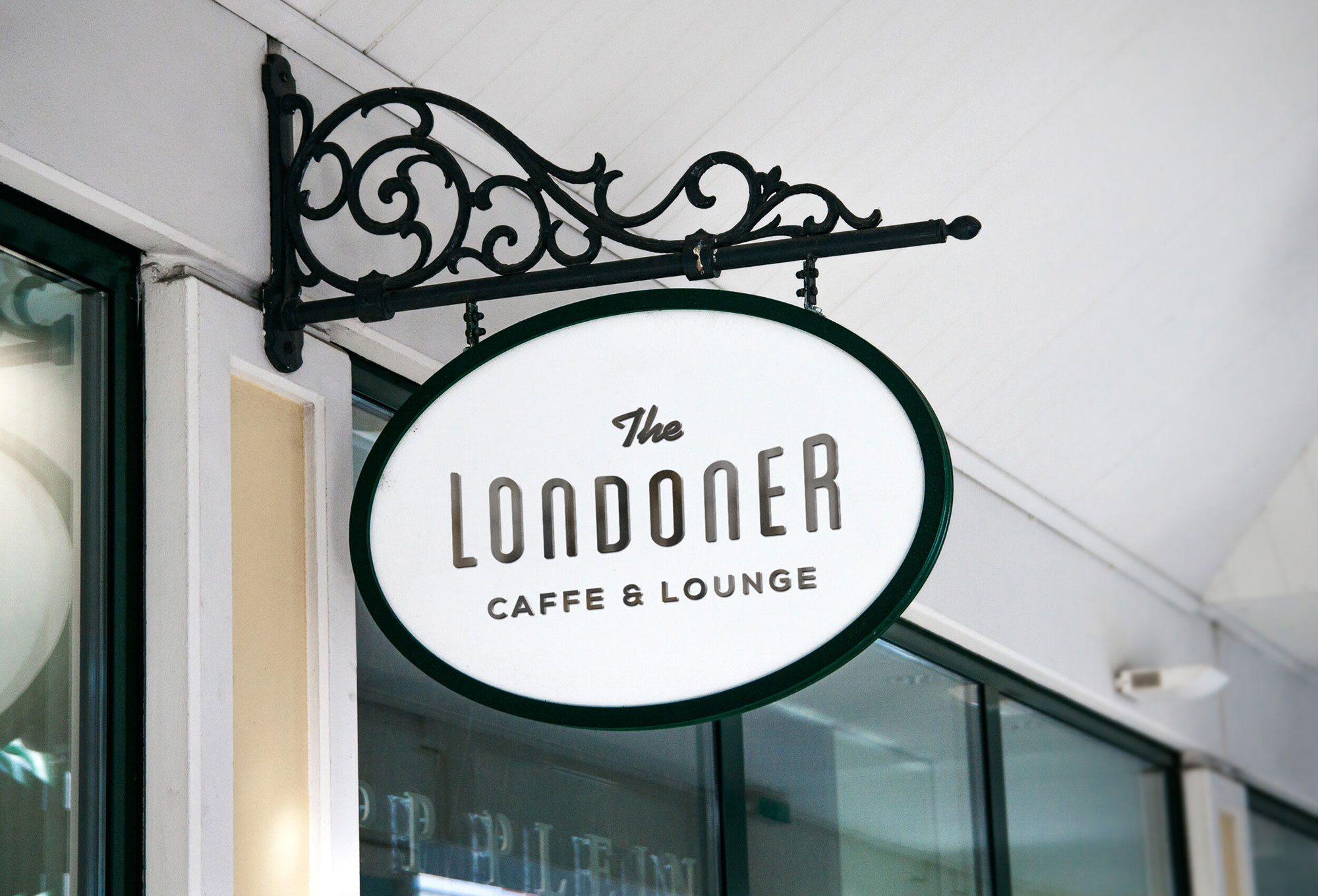 Classy Sign Hanging from the Wall Mockup