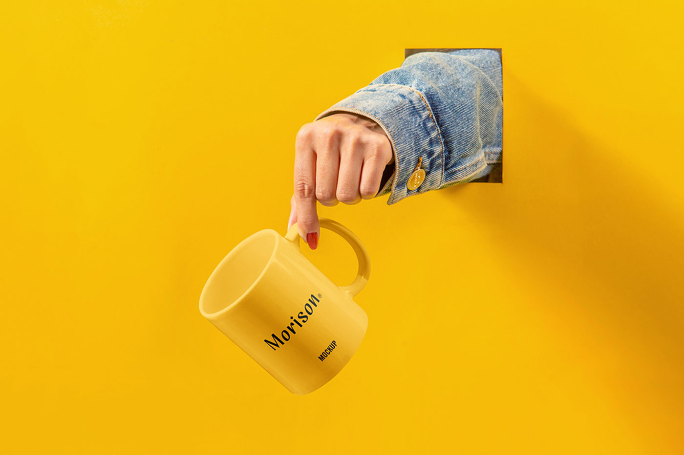 Hand Holding Mug out of Hole on the Wall Mockup