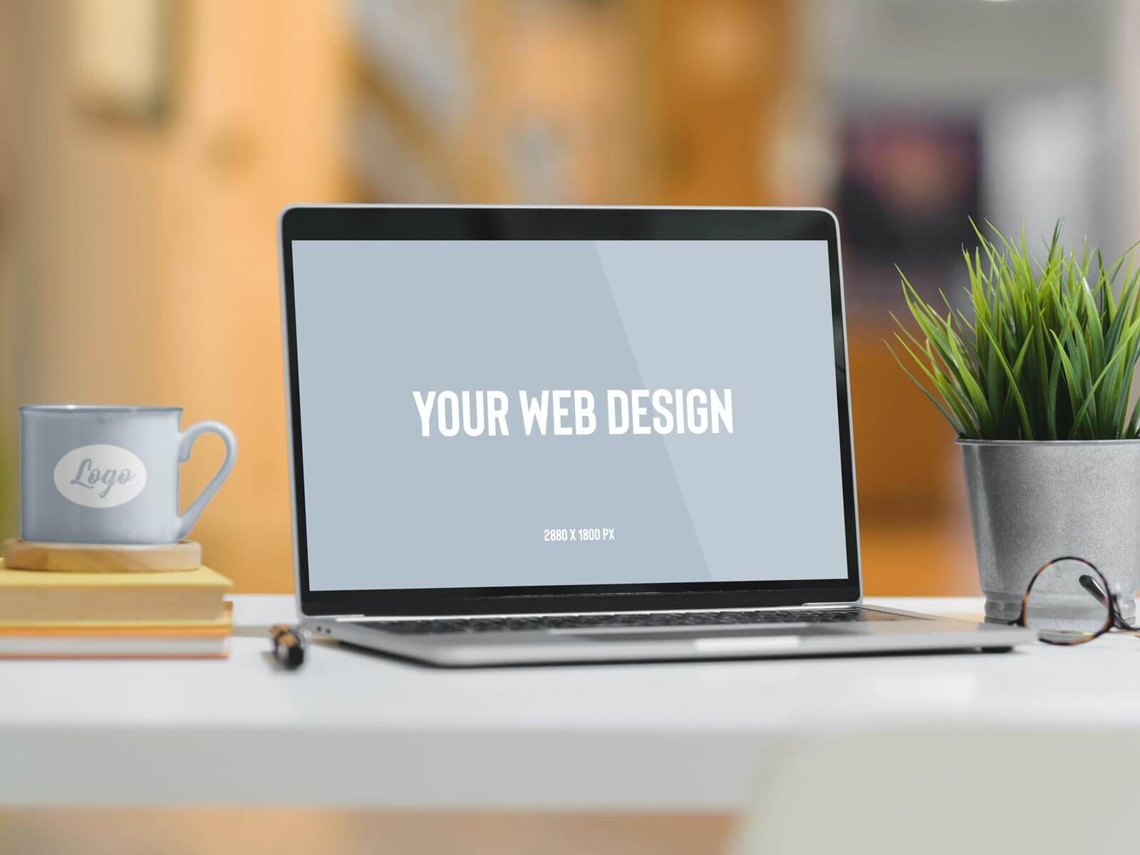 Mockup Featuring a Mug and a Laptop