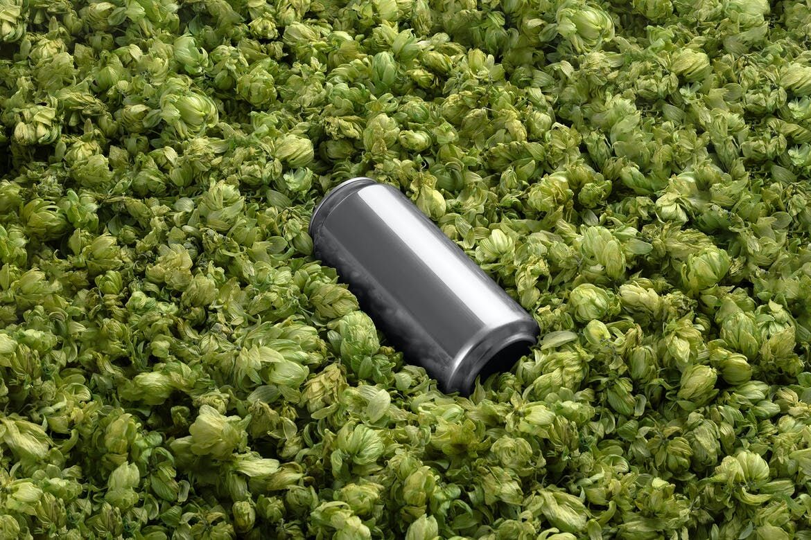 Beer Can Mockup with Green Blossom Background