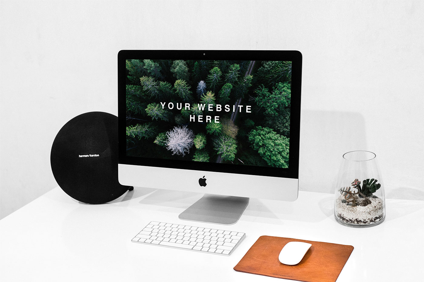 Workspace iMac Mockup Featuring a Mouse and a Keyboard