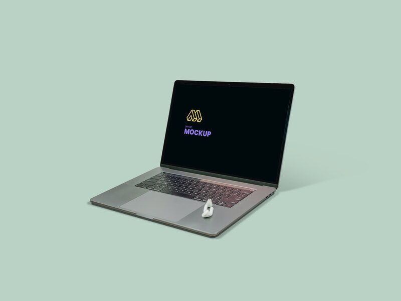 Mockup Featuring a Open MacBook