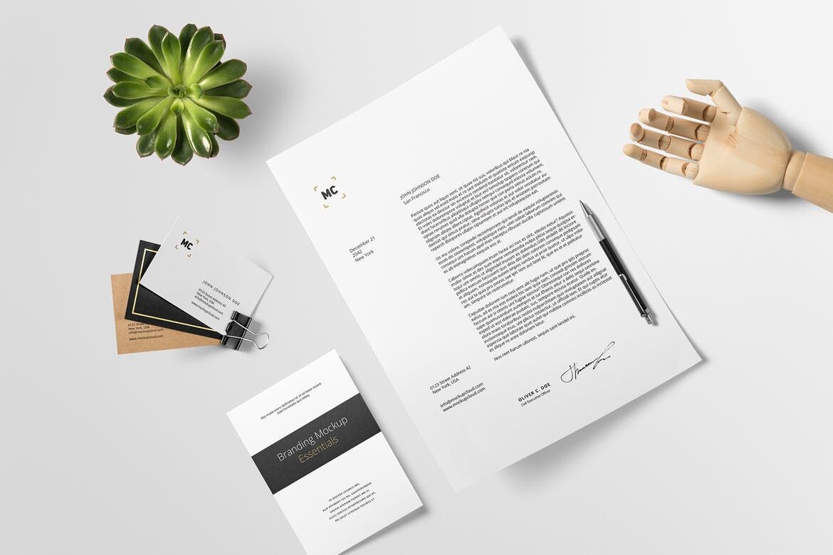 Branding Stationery Mockup with Decorative Hand and Plant