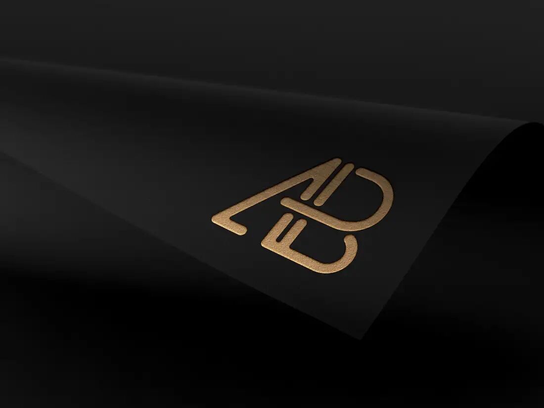 Gold, Silver, and Broonze Logo on Dark Foil Mockup