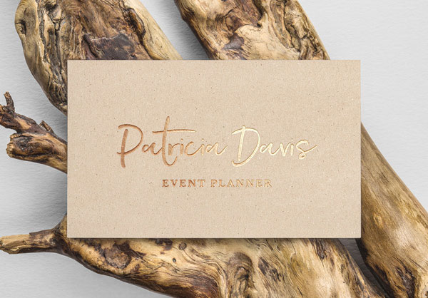 Gold Foil Effect Business Card on a Wood Branch Mockup