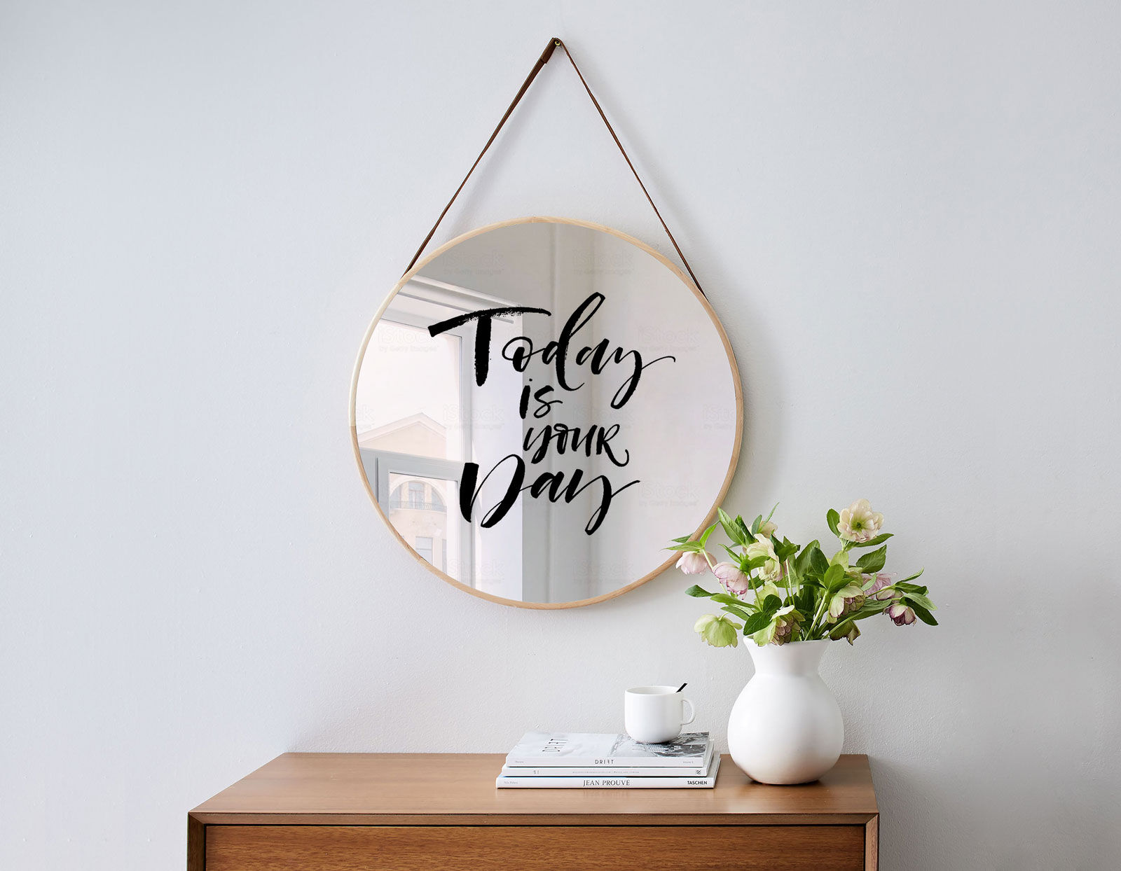Mockup of a Round Mirror Hanging on the Wall