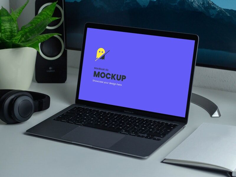 Mockup of a MacBook Air on a Work Desk