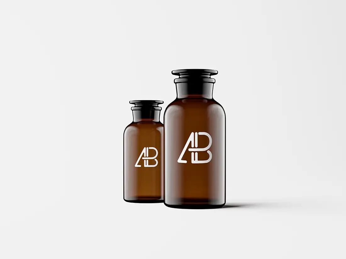 Mockup Featuring Two Amber Glasses Jars