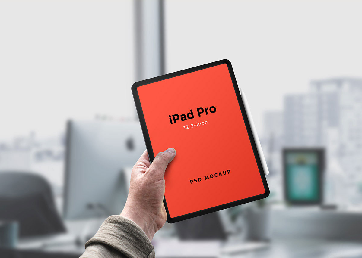 iPad Pro with Apple Pencil Held by a Hand Mockup