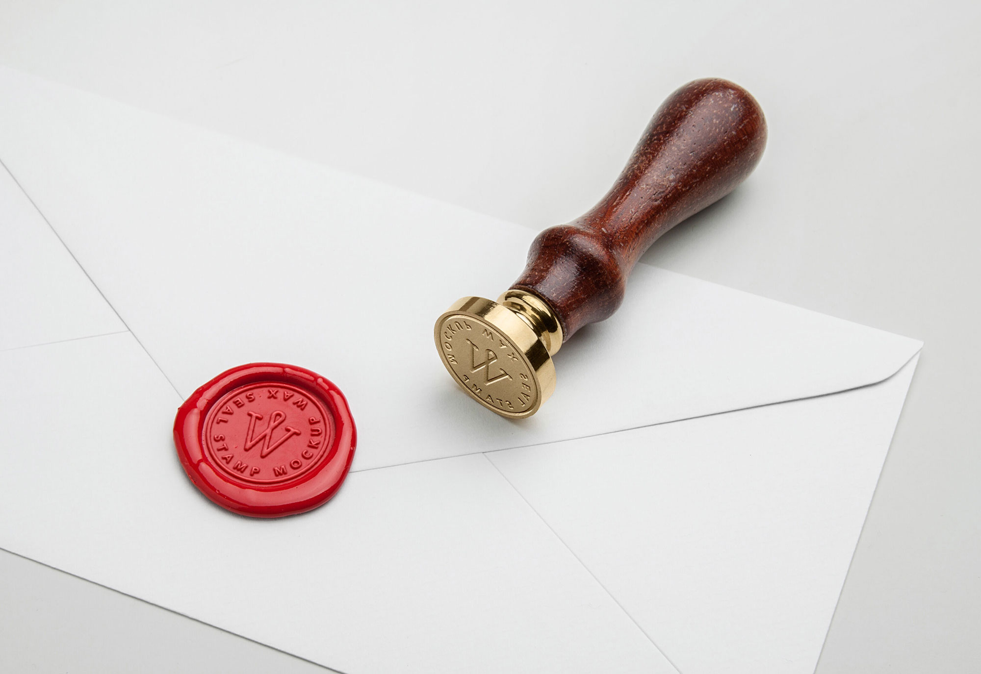 Wooden Wax Seal Stamp with a Sealed Envelope Mockup