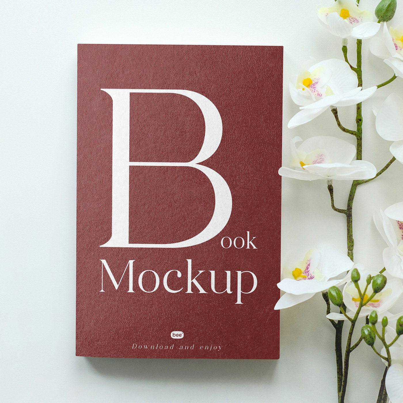 Textured Book Cover with Flower Mockup in Top View preview