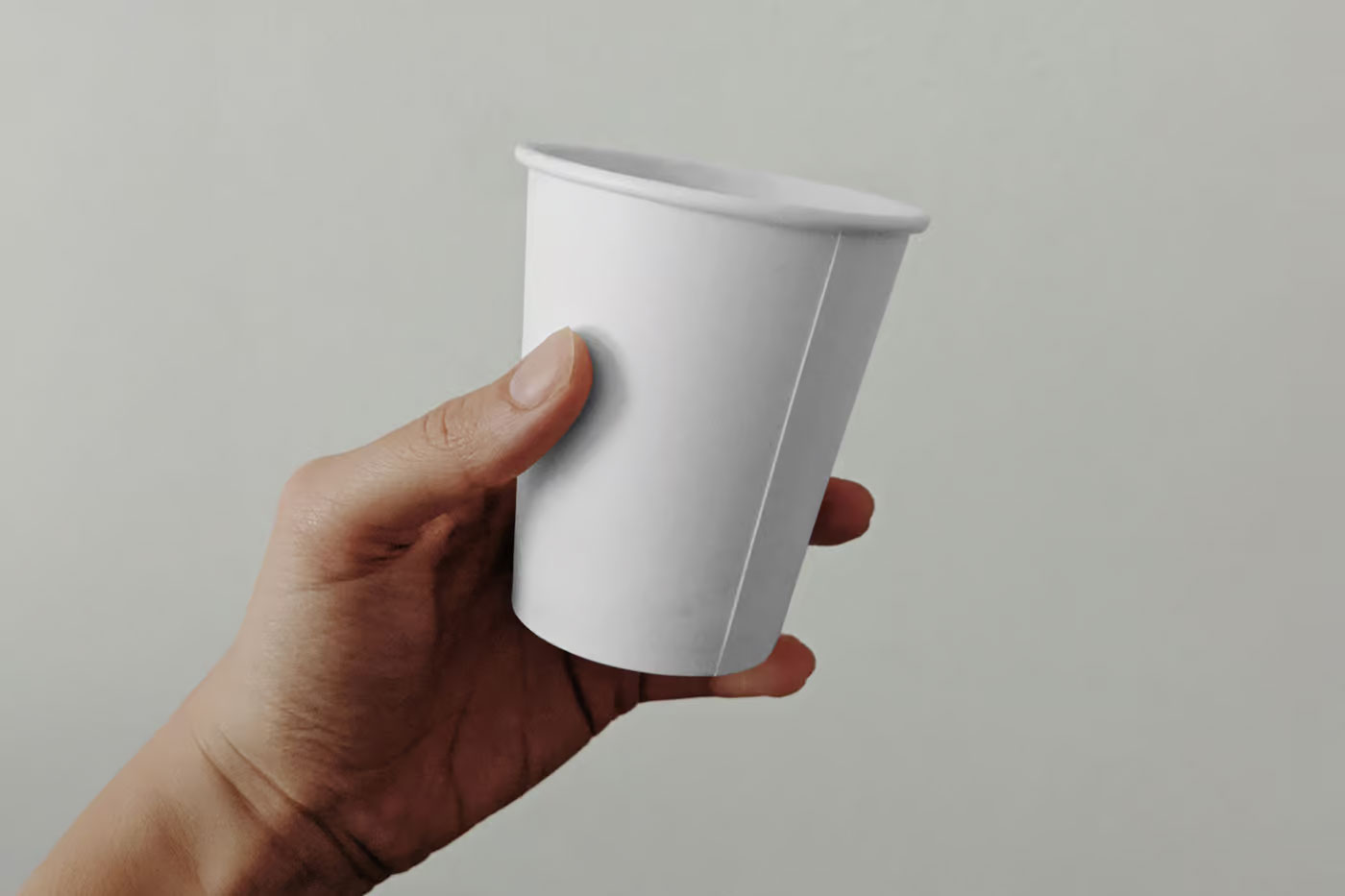 Paper Coffee Cup in Hand Mockup preview