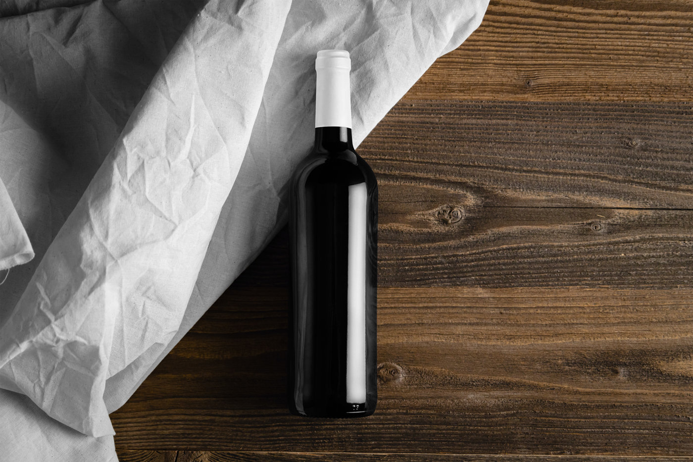 Top View of Wine Bottle Mockup on Wooden Desk preview