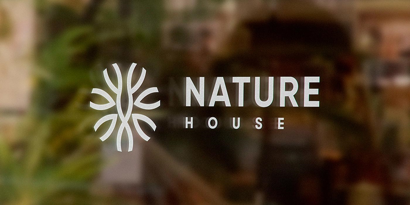 Front View of Logo Sign Mockup on a Shop Window