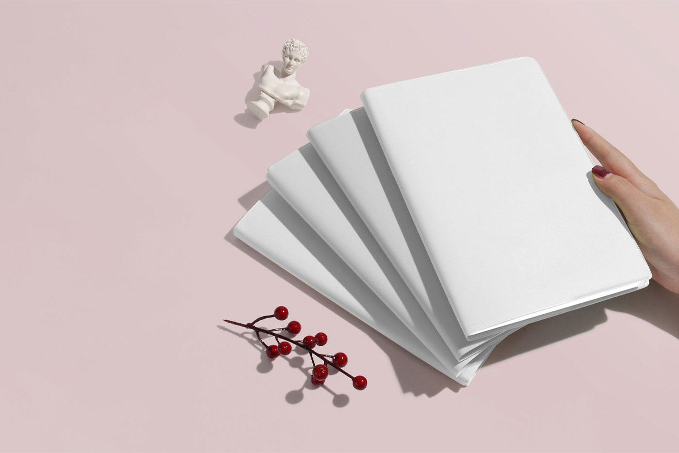 Perspective View of 4 Notebooks Mockup on Top of Each Other preview