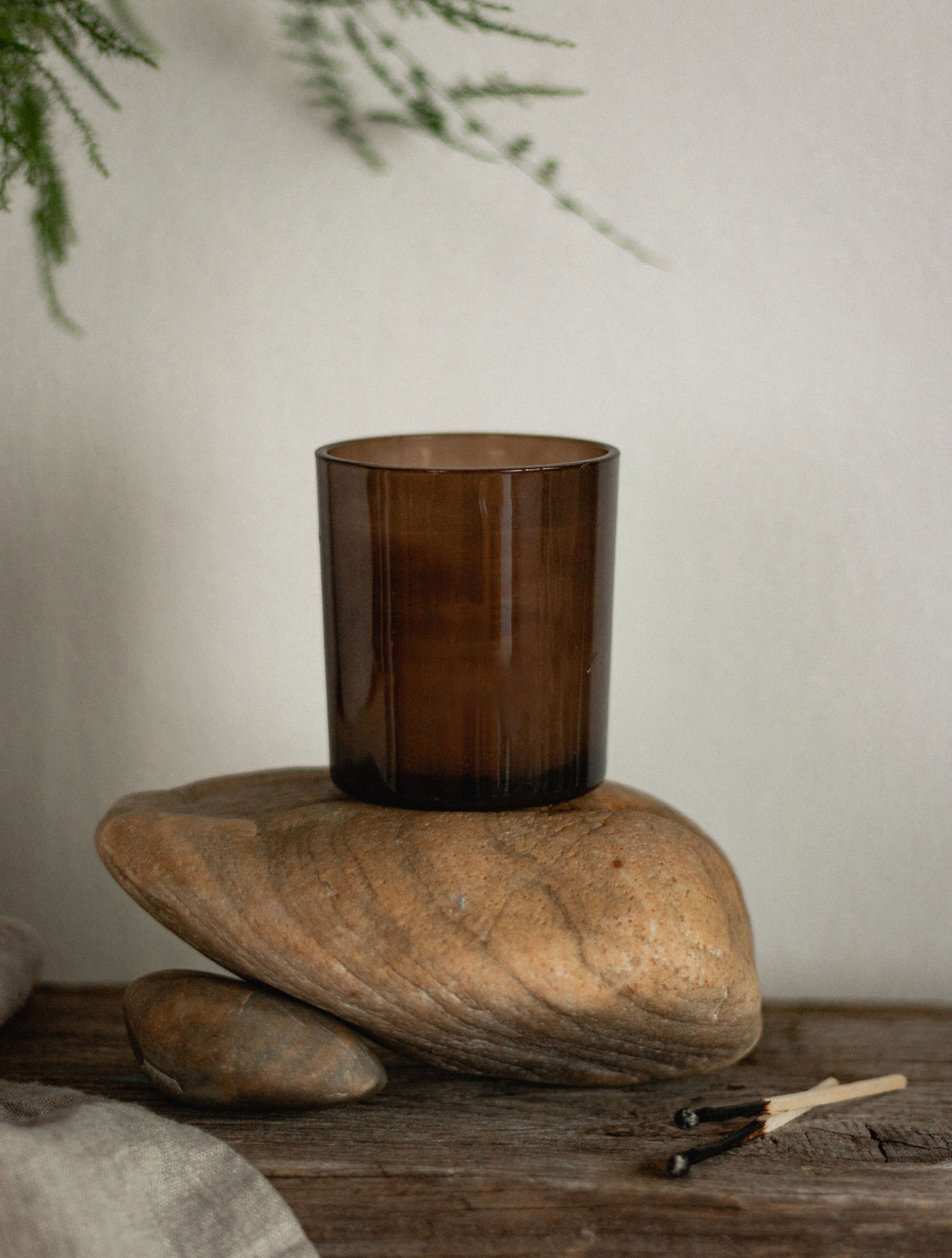 Front View Mockup of Candle on Stone