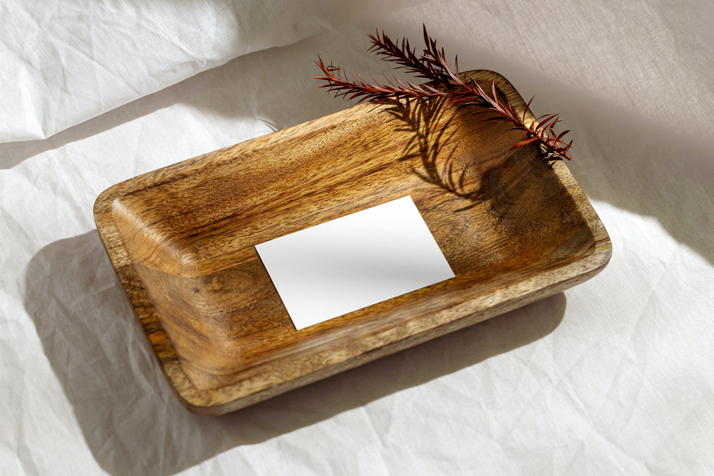 Top View of Business Card Mockup in Deep Wood Plate preview