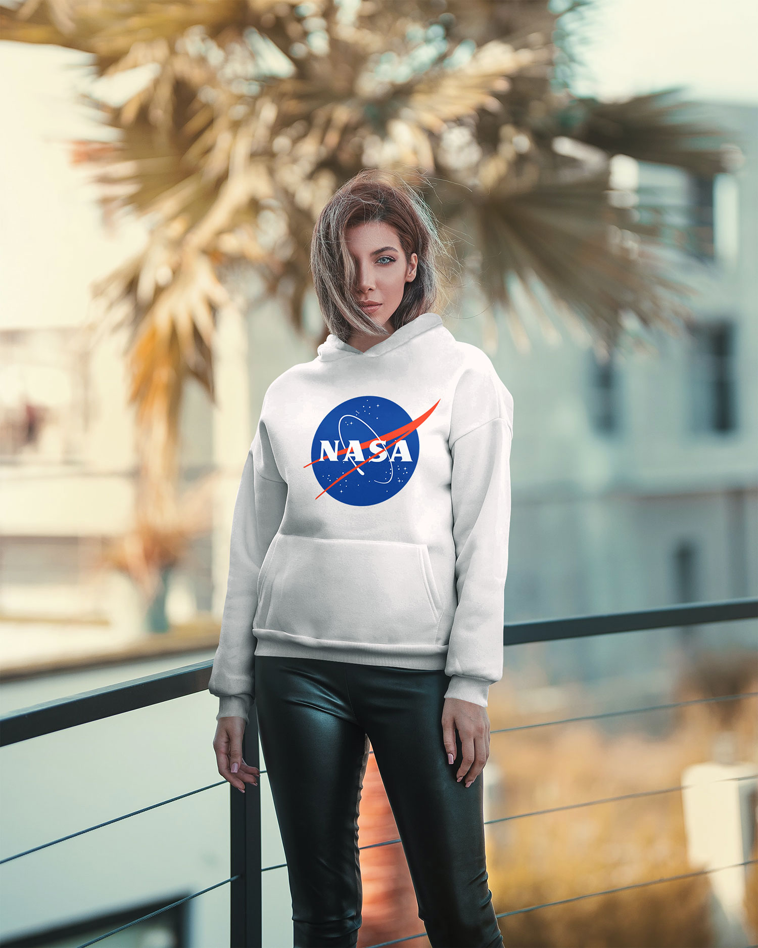 Half-Side View Hoodie Mockup Featuring a Girl Standing Outdoors
