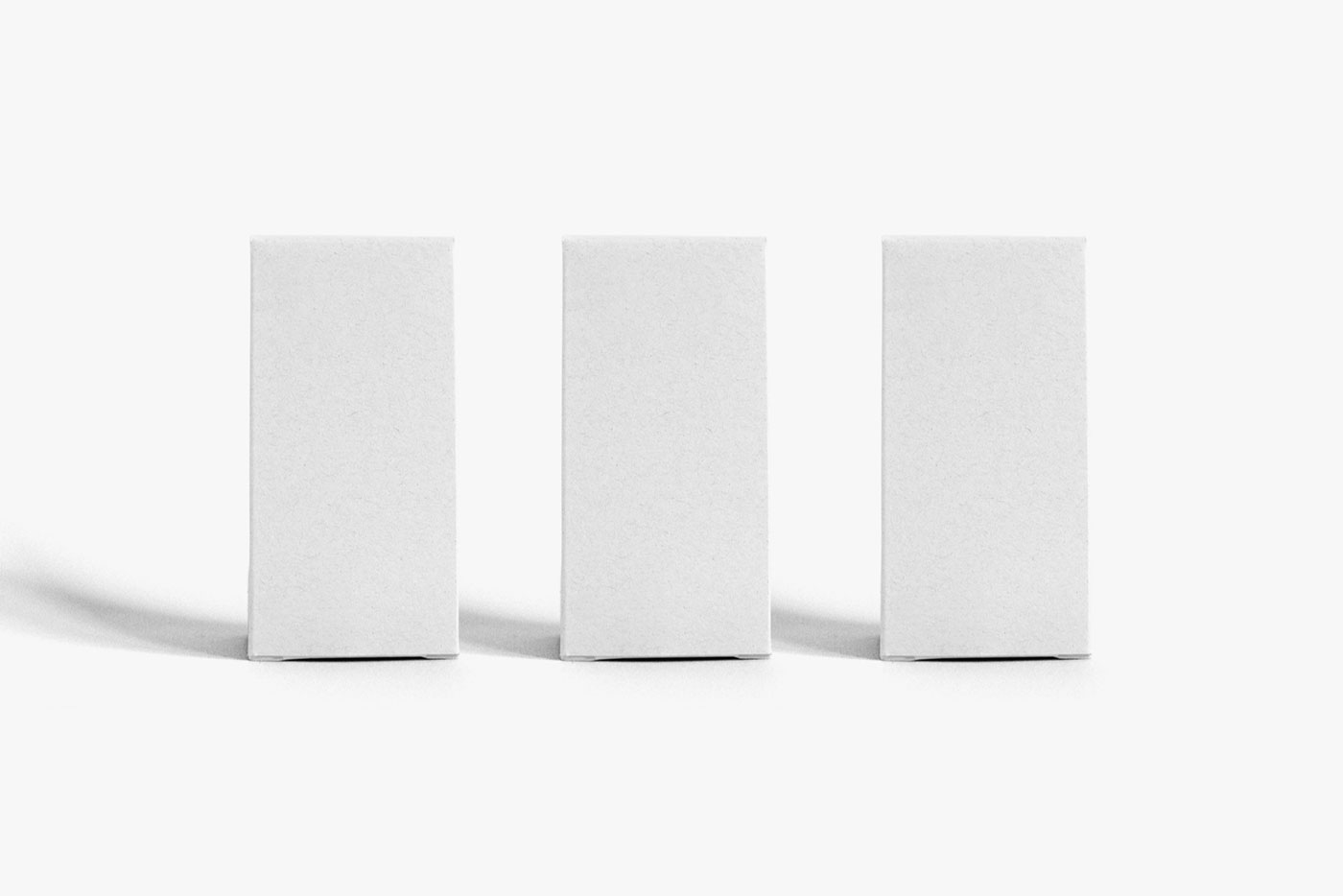 Front View of 3 Vertical Packaging Boxes Mockup preview
