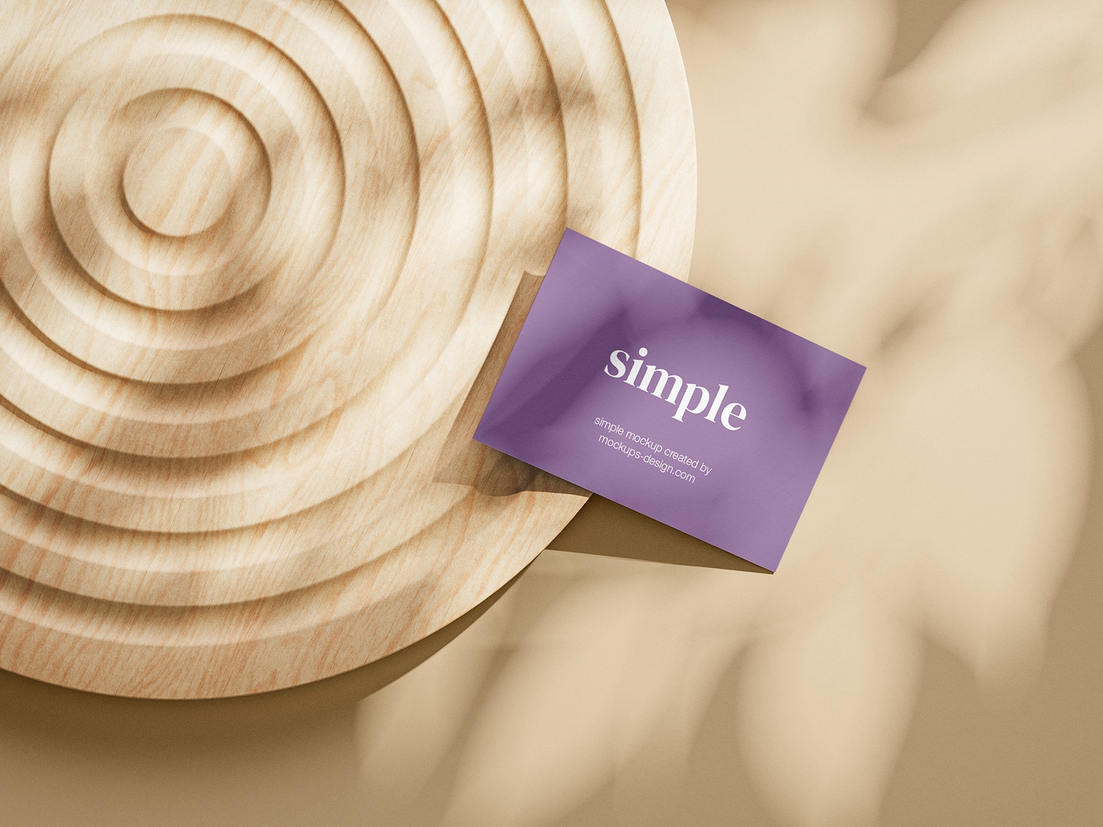 Close-up View of Three Business Card Mockups on a Wooden Ornament preview