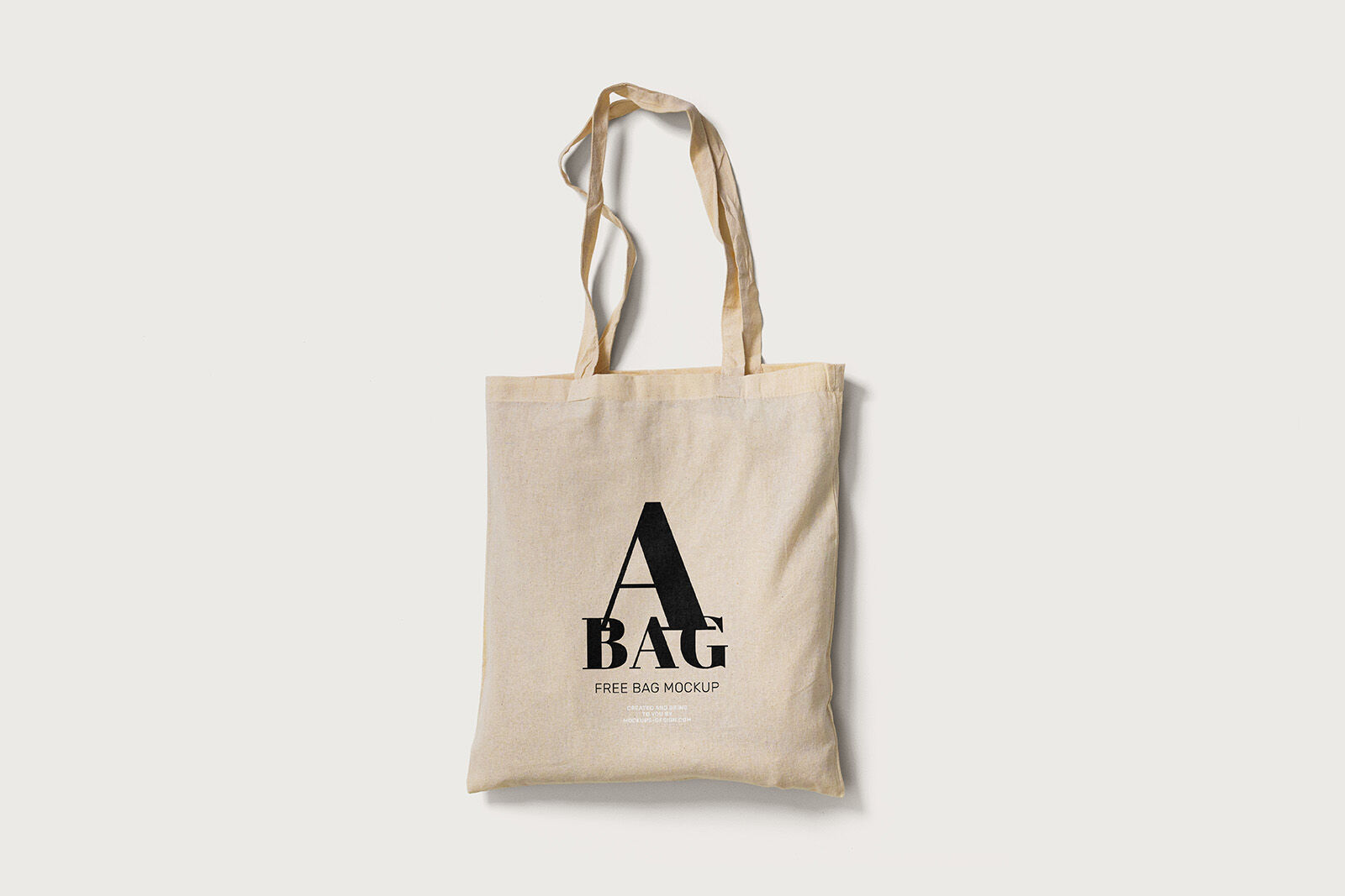 2 Mockups of Tote Bag Laid in Top and Perspective Views preview