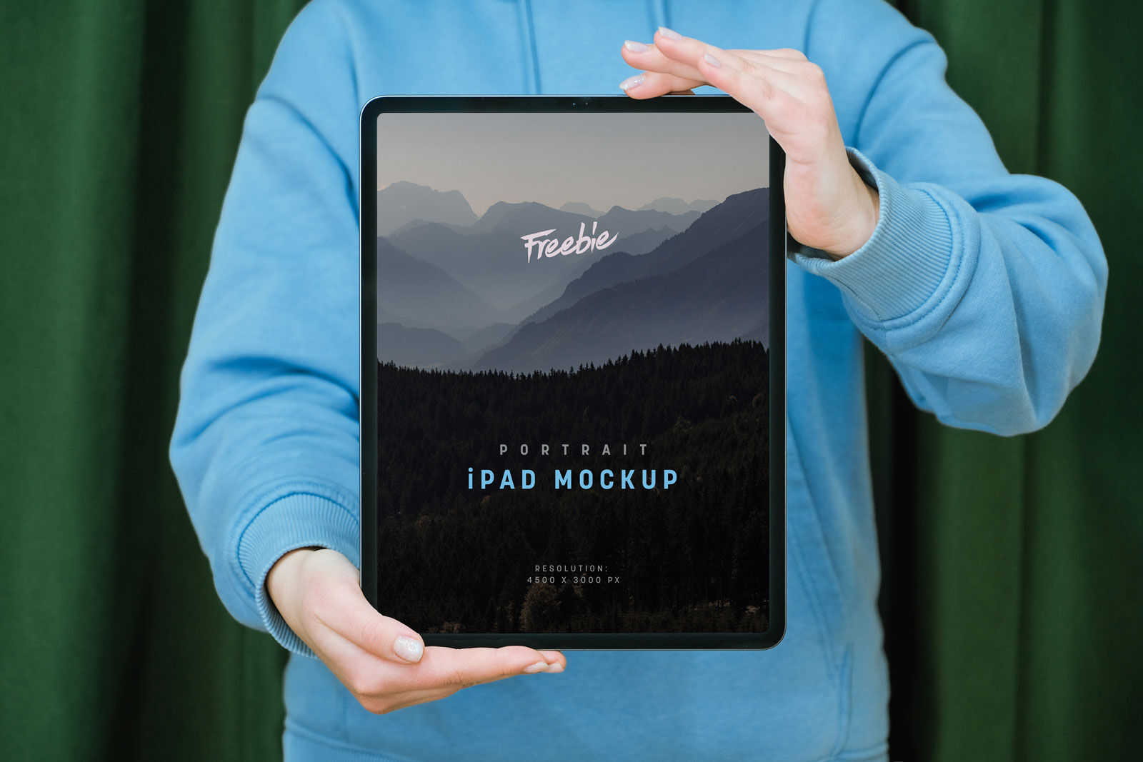 Front View of an iPad Pro in a Man’s Hands Mockup preview