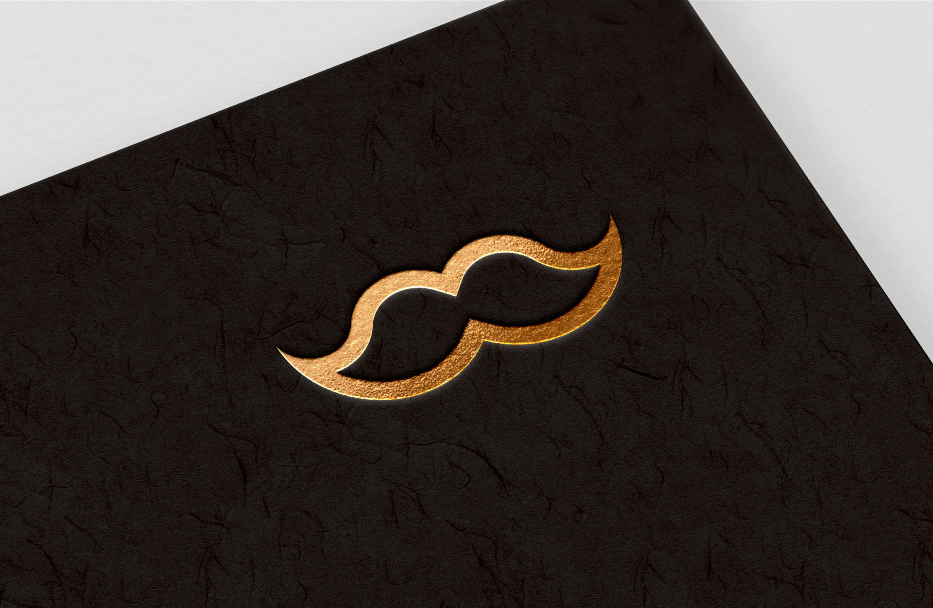 Embossed, Gold Foil Logo on Textured Background in Perspective Mockup preview