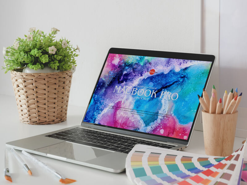 MacBook Pro Mockup Opened on a Desk in Half-Side View preview