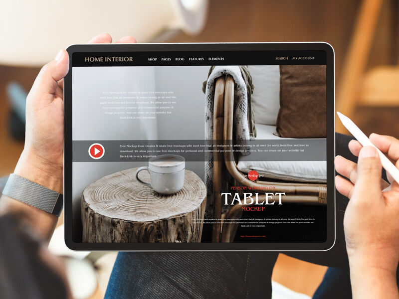 Mockup of a Person Using Tablet