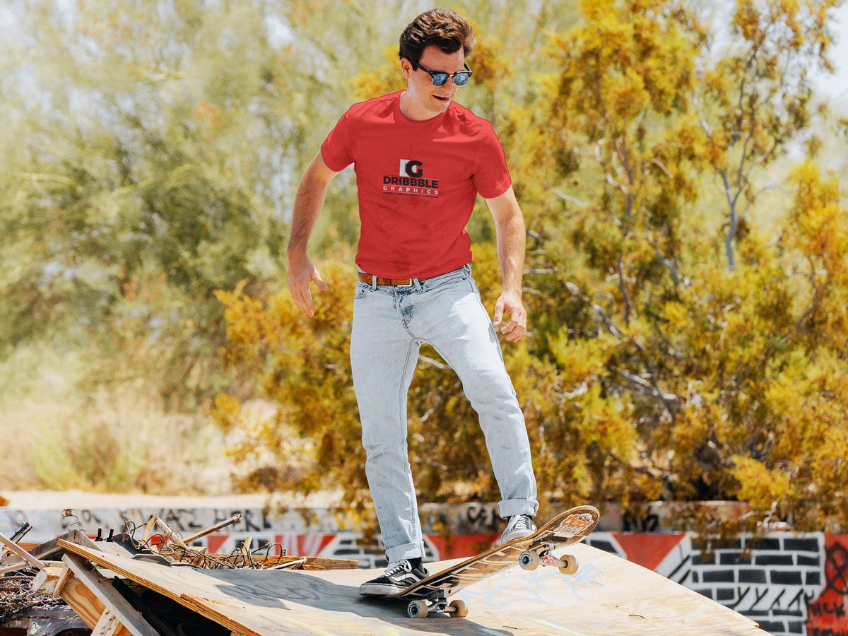 Man Model Skateboarding in Outdoor Environment Wearing T-Shirt Mockup