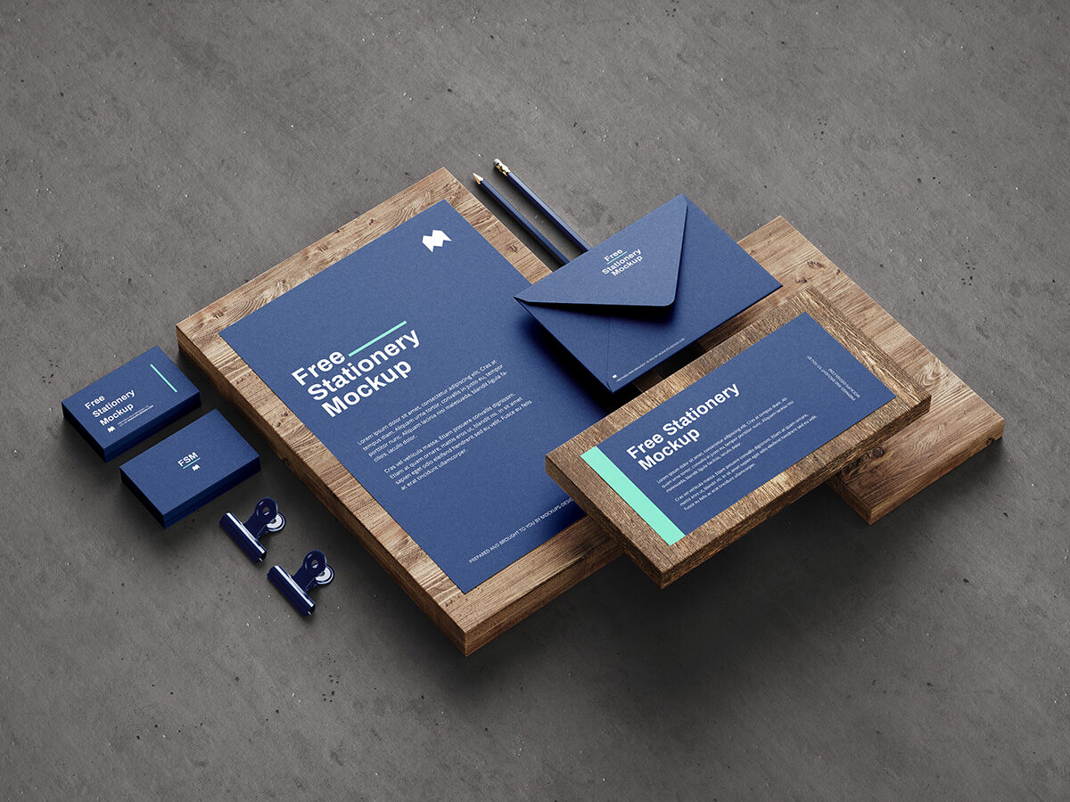 5 Mockups of Stationery in Different Views Featuring Wooden Boards preview
