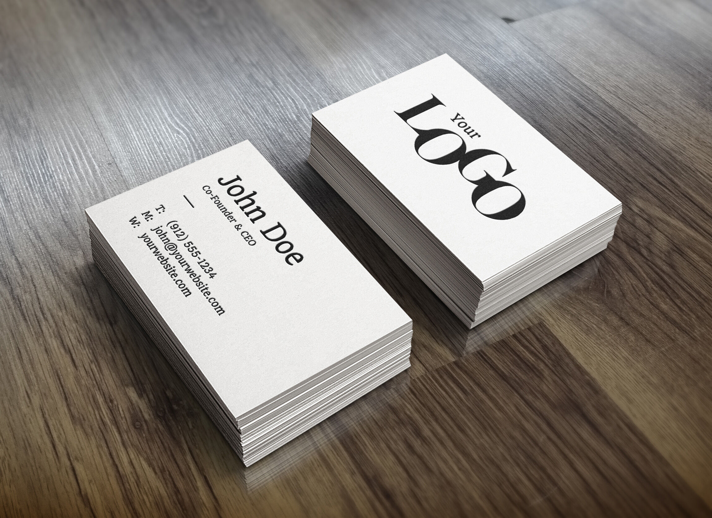 Perspective View of Two Packs of Business Card on Wooden Surface Mockup preview
