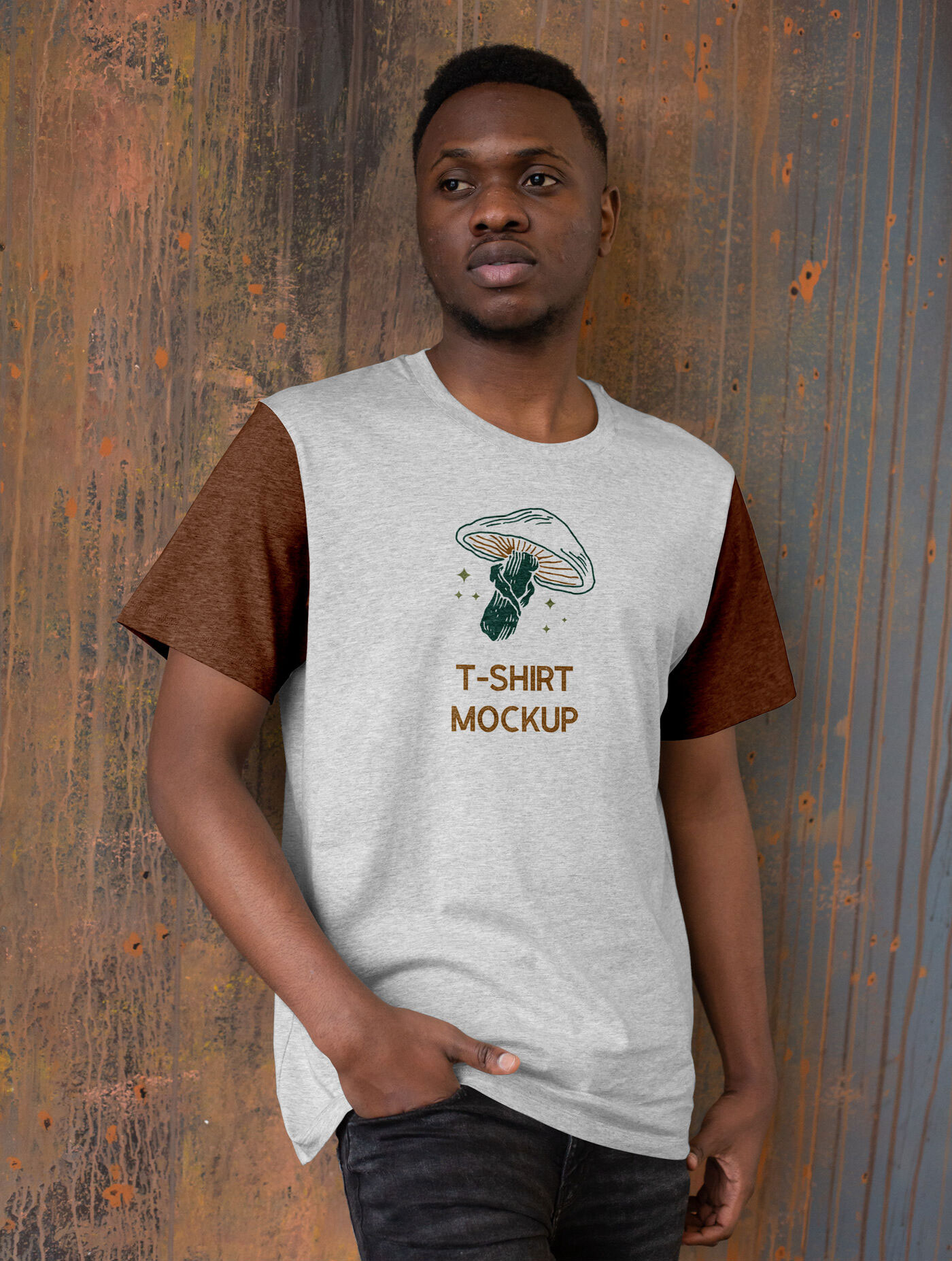 T-Shirt Mockup of a Model Standing with One Hand in Pocket