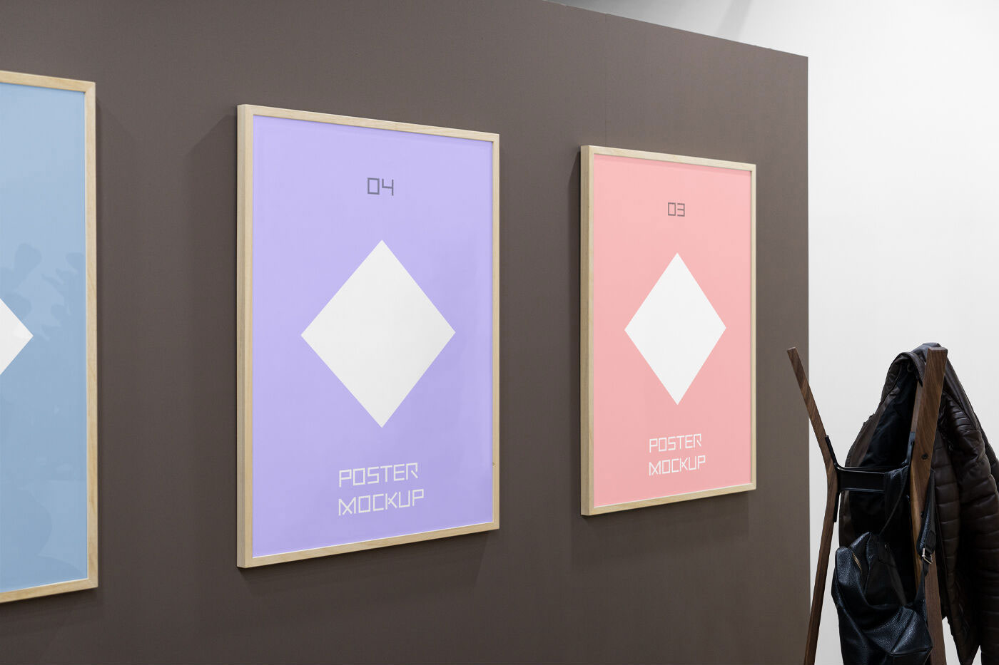 Mockup Featuring Three Posters on a Wall