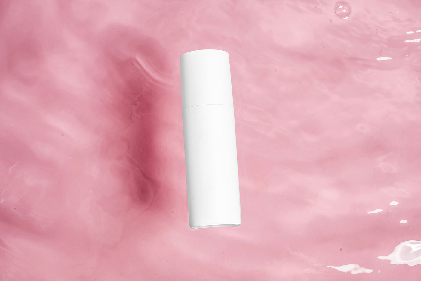 Cosmetic Bottle Floating in Water Mockup preview