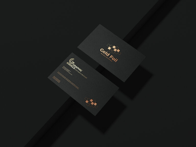 Mockup of Two Golden Foil Business Cards at the 3\4 Angle View preview