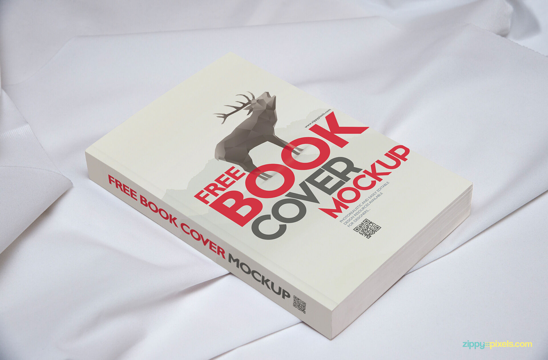 Book Mockup Laid on Cotton Sheet in Perspective preview