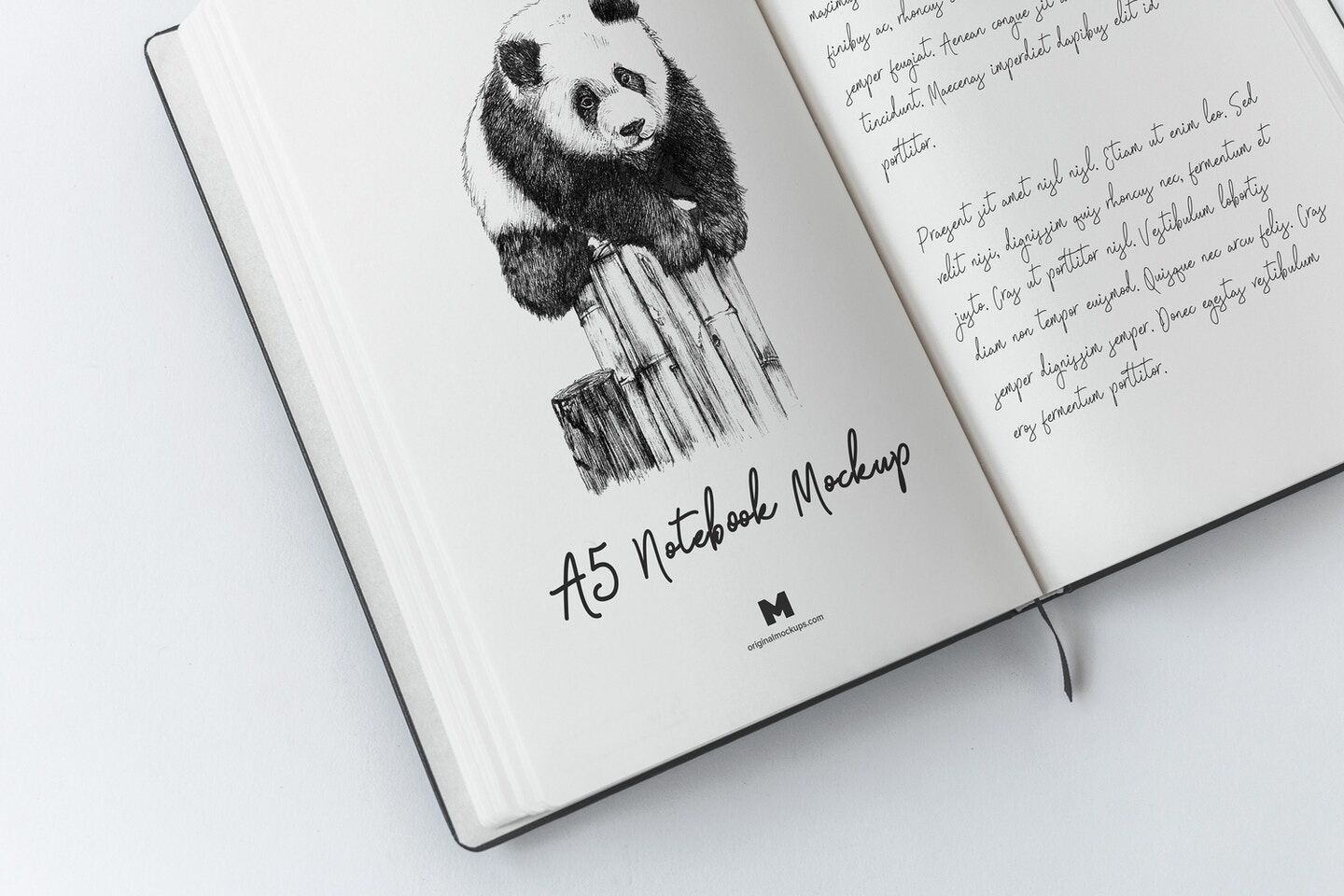 Mockup Displaying Opened A5 Hardcover Notebook with Sheet Separator